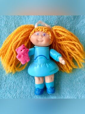 1984 Cabbage Patch Kids 3.5” Posable PVC Doll in a Blue Rubber/Foam Dress